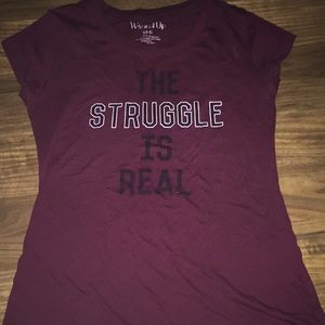 A maroon color shirt